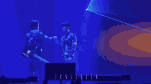 two men shaking hands on a stage with the letters ixvi ii ix on the bottom