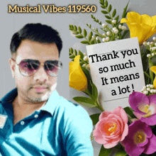 a man wearing sunglasses stands in front of a bouquet of flowers with a thank you card