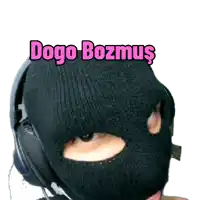 a person wearing headphones and a ski mask with the name dogo bozmus written on the top