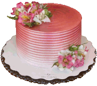 a pink cake with pink and white flowers is on a plate that says bp bia paixao