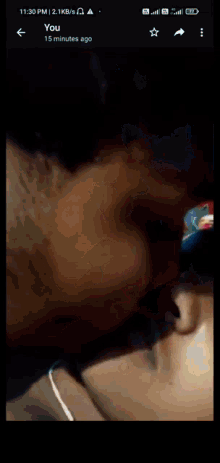 a phone screen shows a person 's face and says " you 15 minutes ago "
