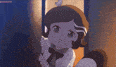 a cartoon girl with a bow on her head is standing in front of a door