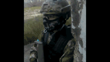 a soldier wearing a mask with a skull on it
