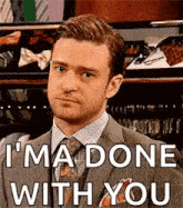 a man in a suit and tie is saying `` i 'm done with you ''