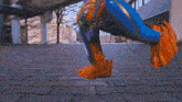 a person is jumping in the air in front of a building that says ' tokyo ' on the side