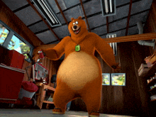 a cartoon bear with a necklace that says ' a ' on it