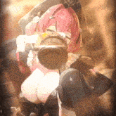 a girl with pink hair is wearing a pirate hat and drinking from a bucket .
