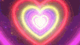 a rainbow of neon hearts on a purple background .