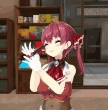 a girl with red hair and white gloves holds a blue object