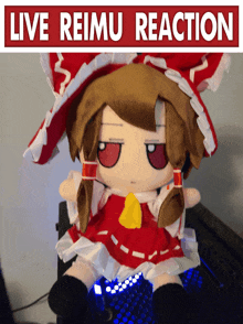 a stuffed doll with the words live reimu reaction above it
