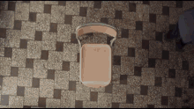a chair is sitting on a tiled floor in a room