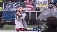 a football game between the 49ers and seahawks