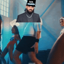 drake is wearing a mr. oreo hat in a video