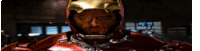 a close up of a man wearing a helmet that looks like iron man