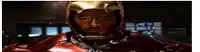 a close up of a man wearing a helmet that looks like iron man