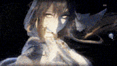 a close up of a girl with long hair in a video game with a black background .