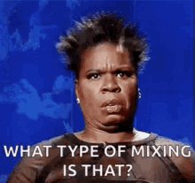 a woman is making a funny face with the words `` what type of mixing is that ? ''