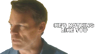 a close up of a man 's face with the words he 's nothing like you below it