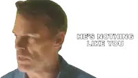 a close up of a man 's face with the words he 's nothing like you below it