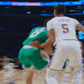 a basketball player with the number 5 on the back of his shirt