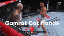 two men in a boxing ring with the words gamrot got hands on the bottom
