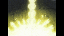 a yellow light is coming out of the ground