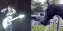 a man playing a guitar next to a horse drinking from a trough