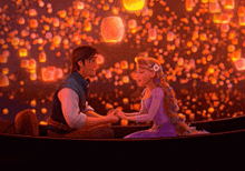 a man and a woman holding hands in a boat with lanterns floating in the background
