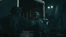 a poster for thunderbolts shows a man holding a shield in a dark room