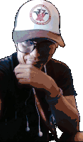 a man wearing glasses and a hat that says harbor
