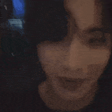 a close up of a person 's face with a mask on .