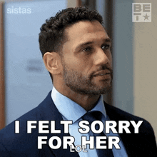 a man in a suit and tie is saying i felt sorry for her .