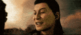 a close up of a man 's face in a video game with a cloudy sky in the background .