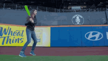 Katie Nolan Bat Flip GIF - Katie Nolan Bat Flip Home Run GIFs