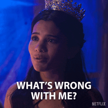 a woman with a crown on her head is asking what 's wrong with me