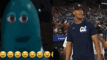 a man in a ny yankees shirt is standing next to a blue monster