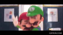 a cartoon of mario and luigi hugging each other in a room .