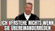 a man in a judge 's robe is giving a speech in a courtroom with a caption in german .