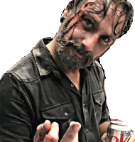 a man with blood on his face is holding a coke can
