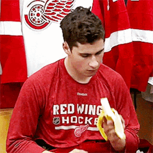 Detroit Red Wings Dylan Larkin GIF - Detroit Red Wings Dylan Larkin Eating Banana GIFs