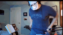 a man wearing a mask and a shirt that says beth math on it