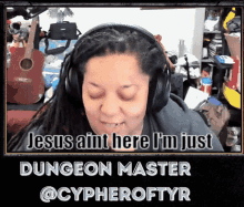 a woman wearing headphones says jesus ain t here i 'm just dungeon master @cypheroftyr