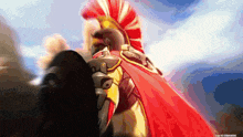 a video game character with a red cape and red helmet