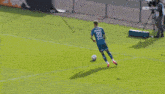 a group of soccer players are playing on a field with a banner that says actual