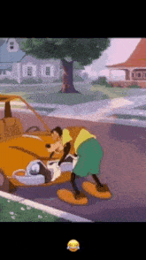 a cartoon of goofy pushing a car with a smiley face in the corner
