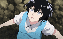 a girl with black hair and blue eyes is wearing a blue vest and white shirt