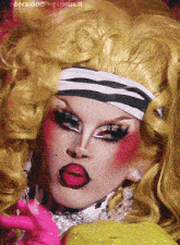 a close up of a drag queen 's face with vonxodd tumblr in the upper right corner