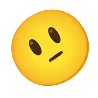 a yellow smiley face with a surprised expression on it