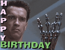 a picture of arnold schwarzenegger holding a robotic hand with the words happy birthday written below him