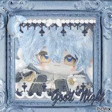 a picture of a stuffed animal in a frame with the words good night written on it